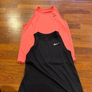 Two Nike tank tops. Junior Sz small